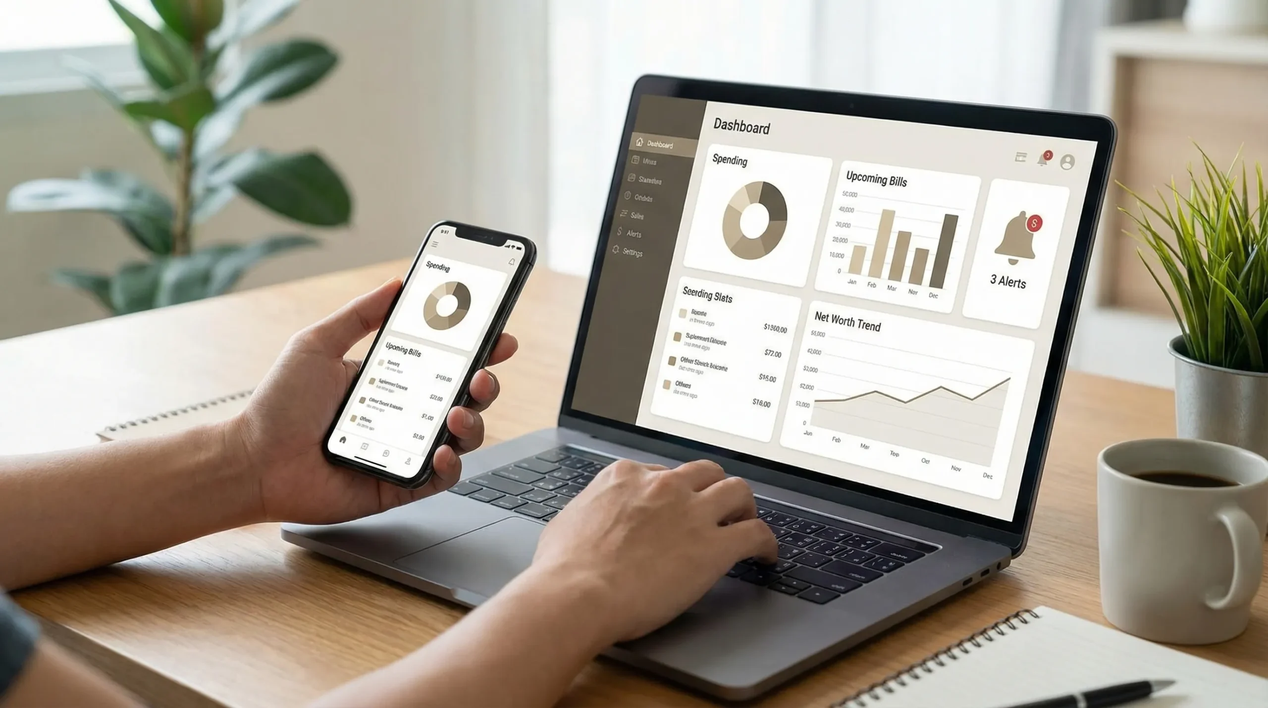 An illustration of a personal finance dashboard showing categorized spending, upcoming bills, net worth trend line, and alert notifications, displayed on a laptop and phone with neutral UI elements and no readable brand names.